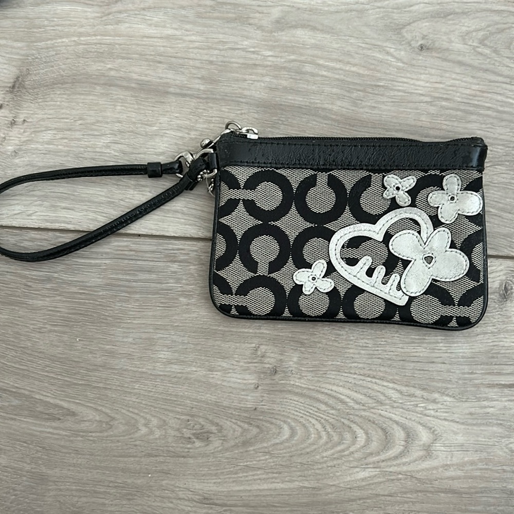 Coach Wristlet - black and white with hearts and flowers.